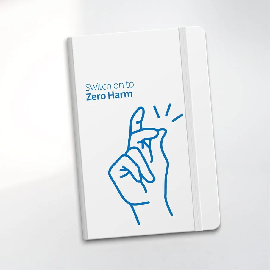 A notebook with the Switch on to Zero Harm finger-click illustration
