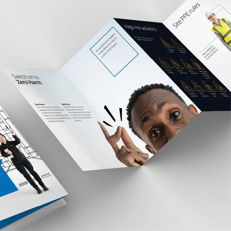 A trifold safety brochure with a person peeking through